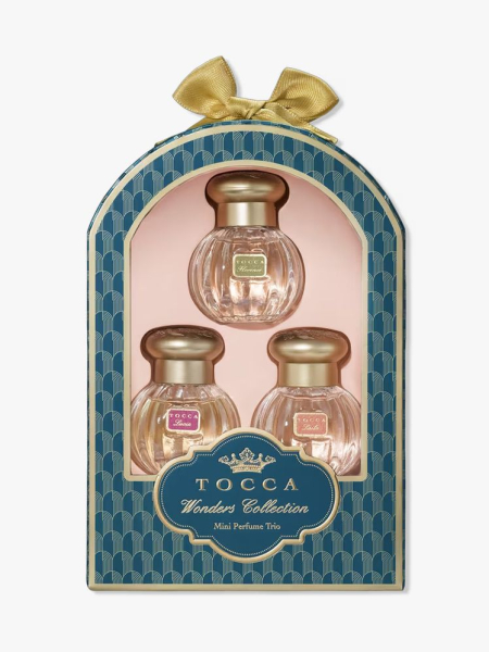 Tocca Wonders Collection Mini Perfume Trio in branded components on a light gray background